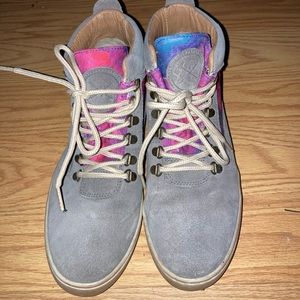 Gray suede boots with blue and pink accents.